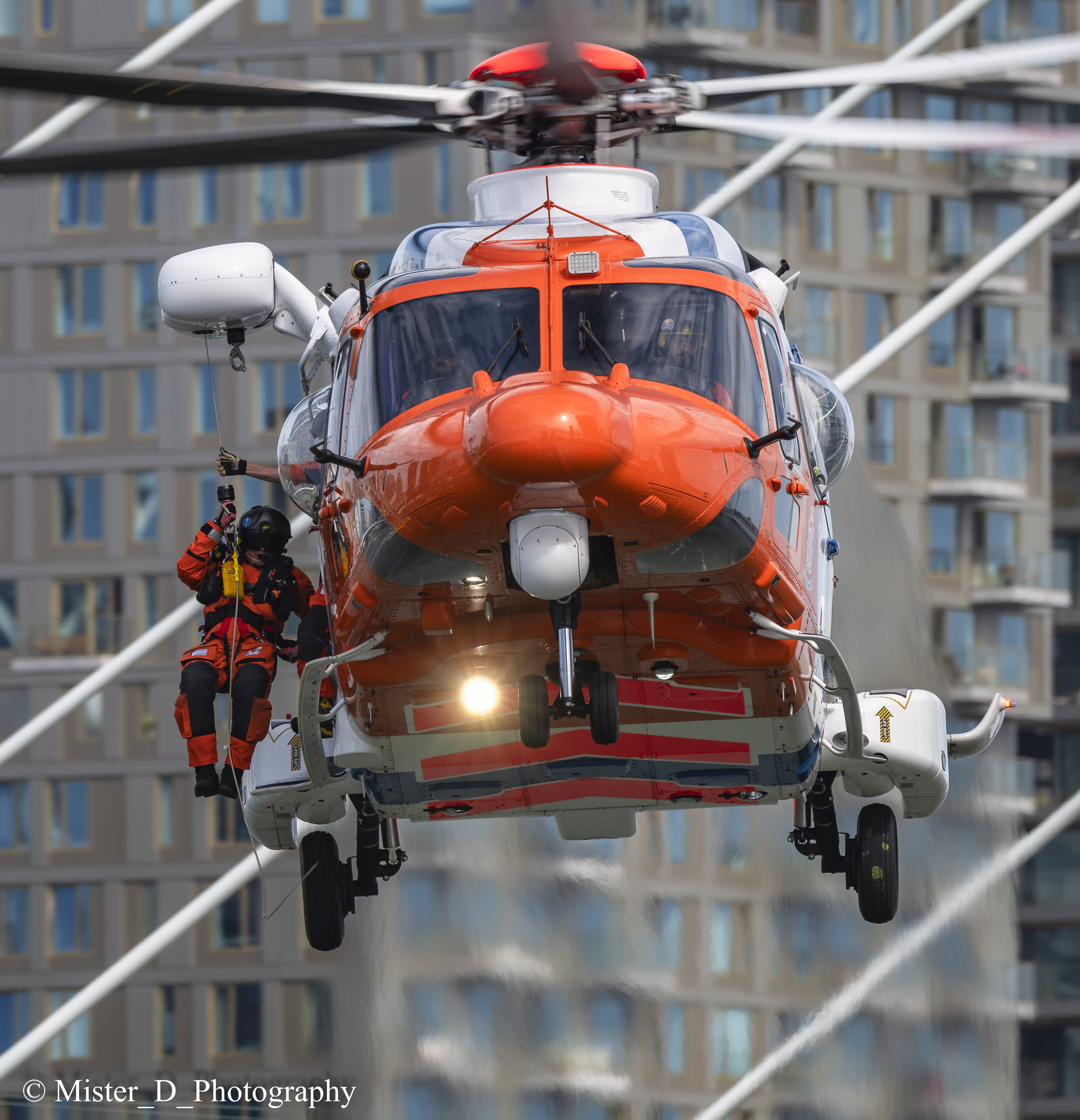 Dutch Coastguard demo at the Wereldhavendagen in Rotterdam
The helicopter is hoovering in front of the famous Erasmusbrug and the coastguard employee is waving at the public