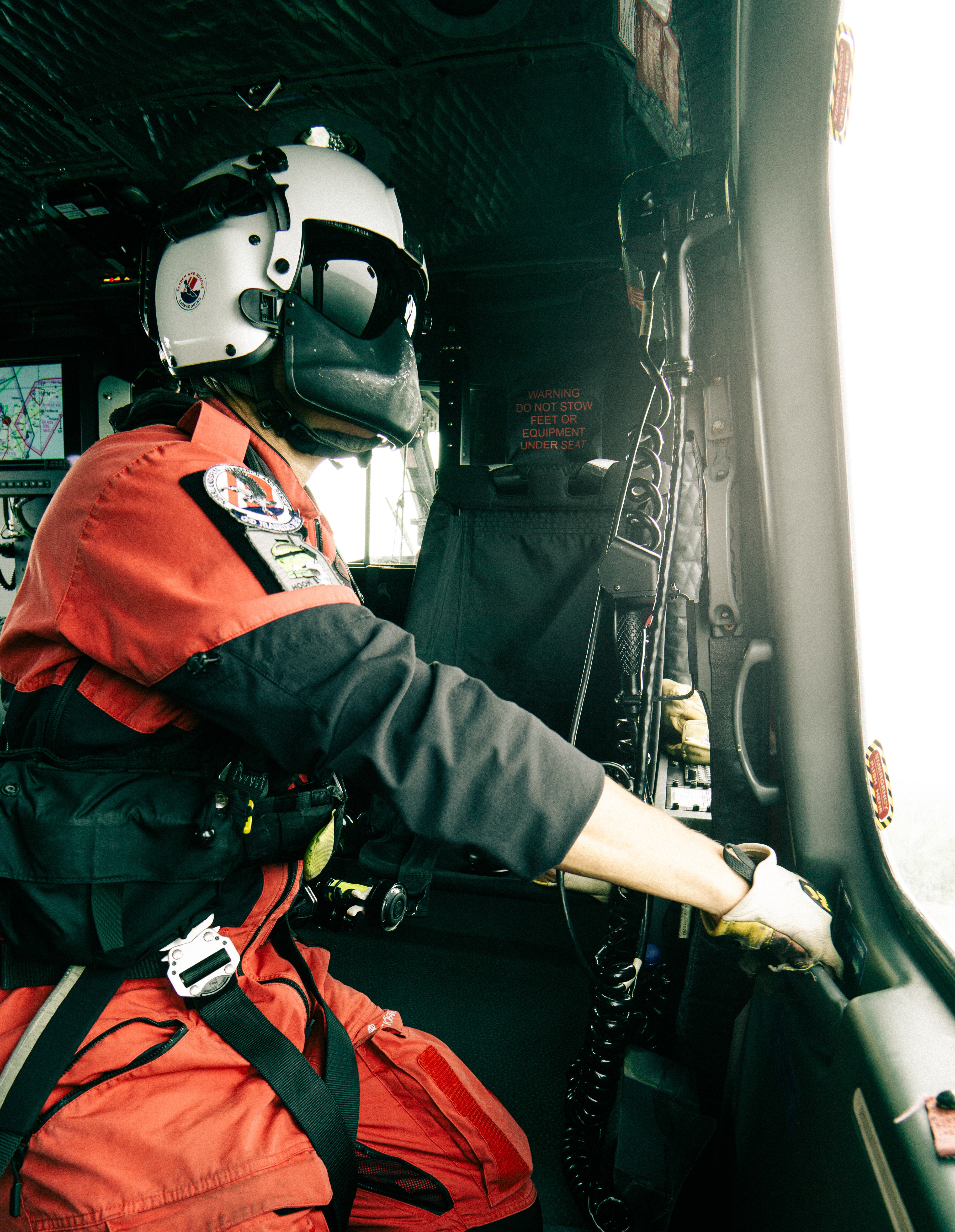 Hoist operator preparing for hoisting of rescueswimmer in the Baltic sea. A standard exercise that we do every day with many different scenarios, moving ship, life raft, cliffs, PIW etc…