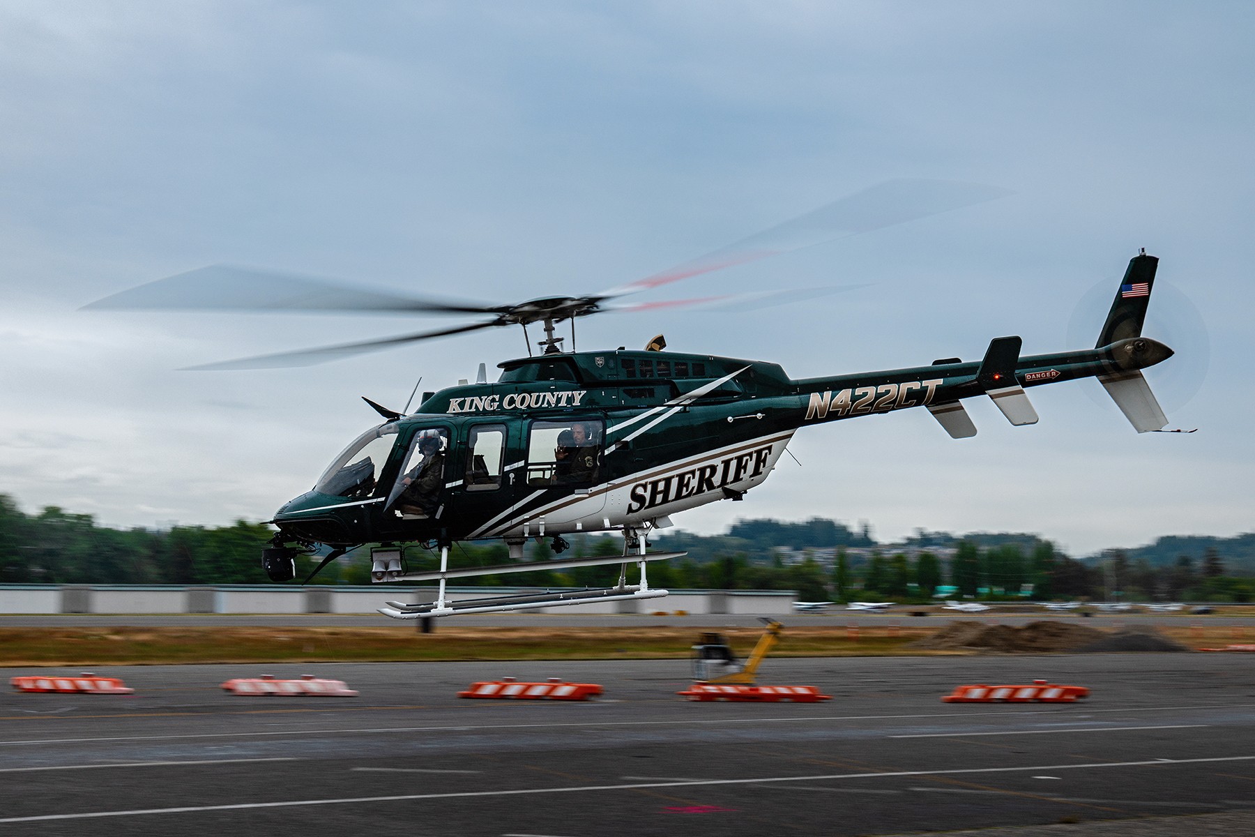 King County Sheriff's Office Air Support Unit "Guardian 1" (N422CT - 2024 Bell Textron Canada Ltd 407) departing their hanger at Renton Municipal Airport. The KCSO Air Support Unit is the only full time air support unit in Washington state and provides a strategic combination of Helicopters and various sUAS.