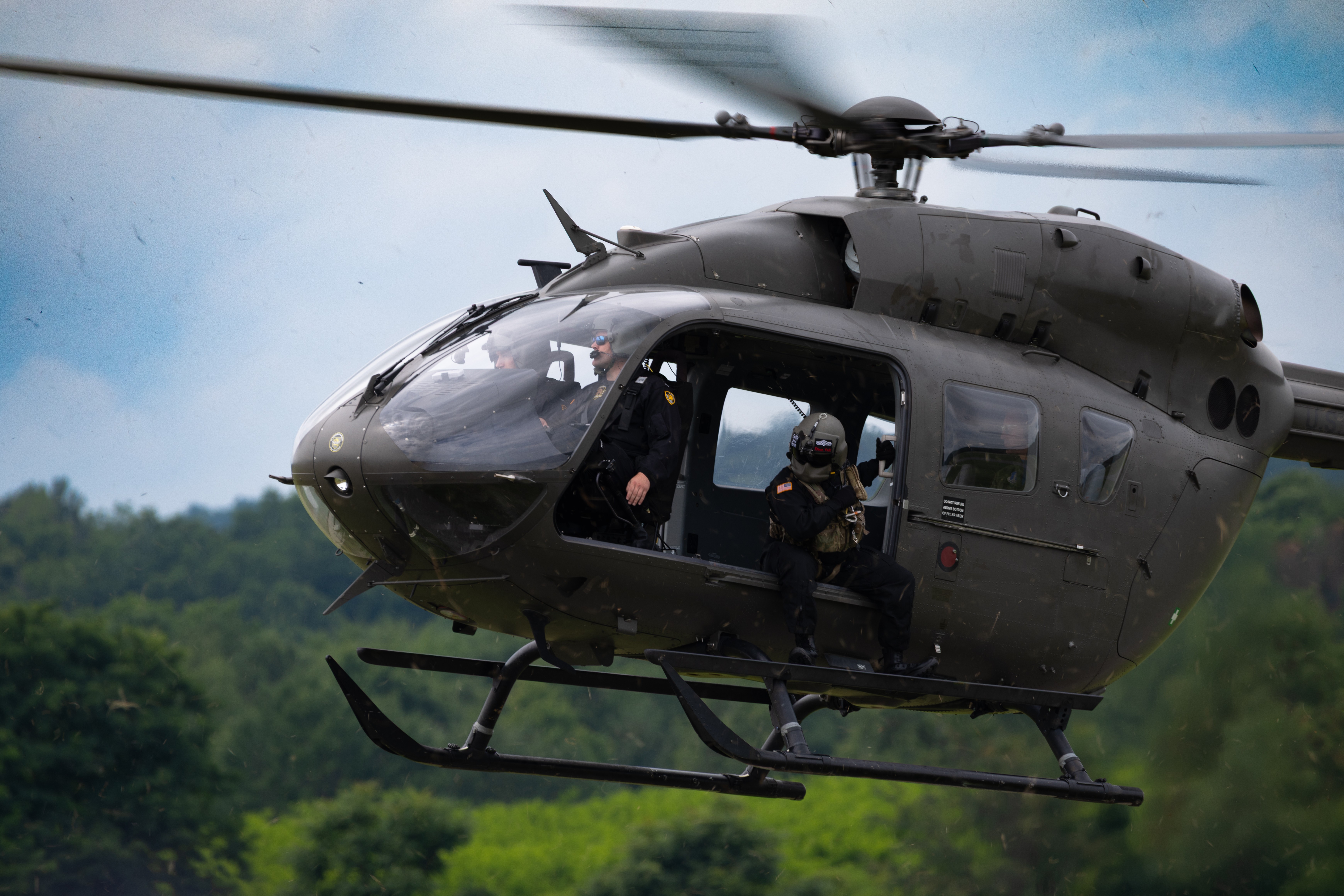 An Airbus UH-72 Lakota of the US Army landing at KMGJ during the 2026 New York International Air Show shortly after deploying the United States Military Academy (West Point) parachute team.