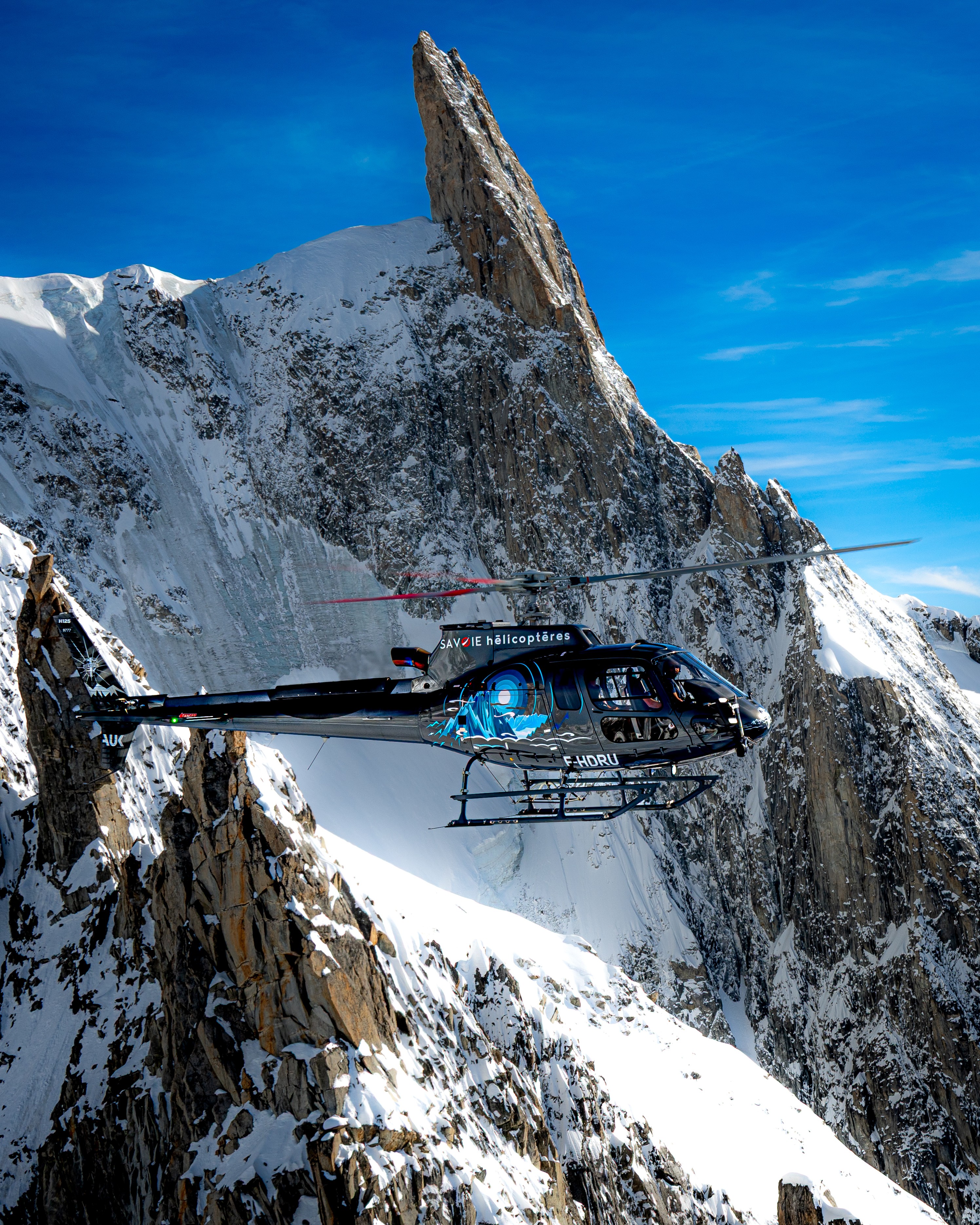 I captured this Savoie Hélicoptères H125 during an air-to-air flight in the Mont Blanc massif. You can see the magnificent paint scheme with the "Dent du Géant" in the background.