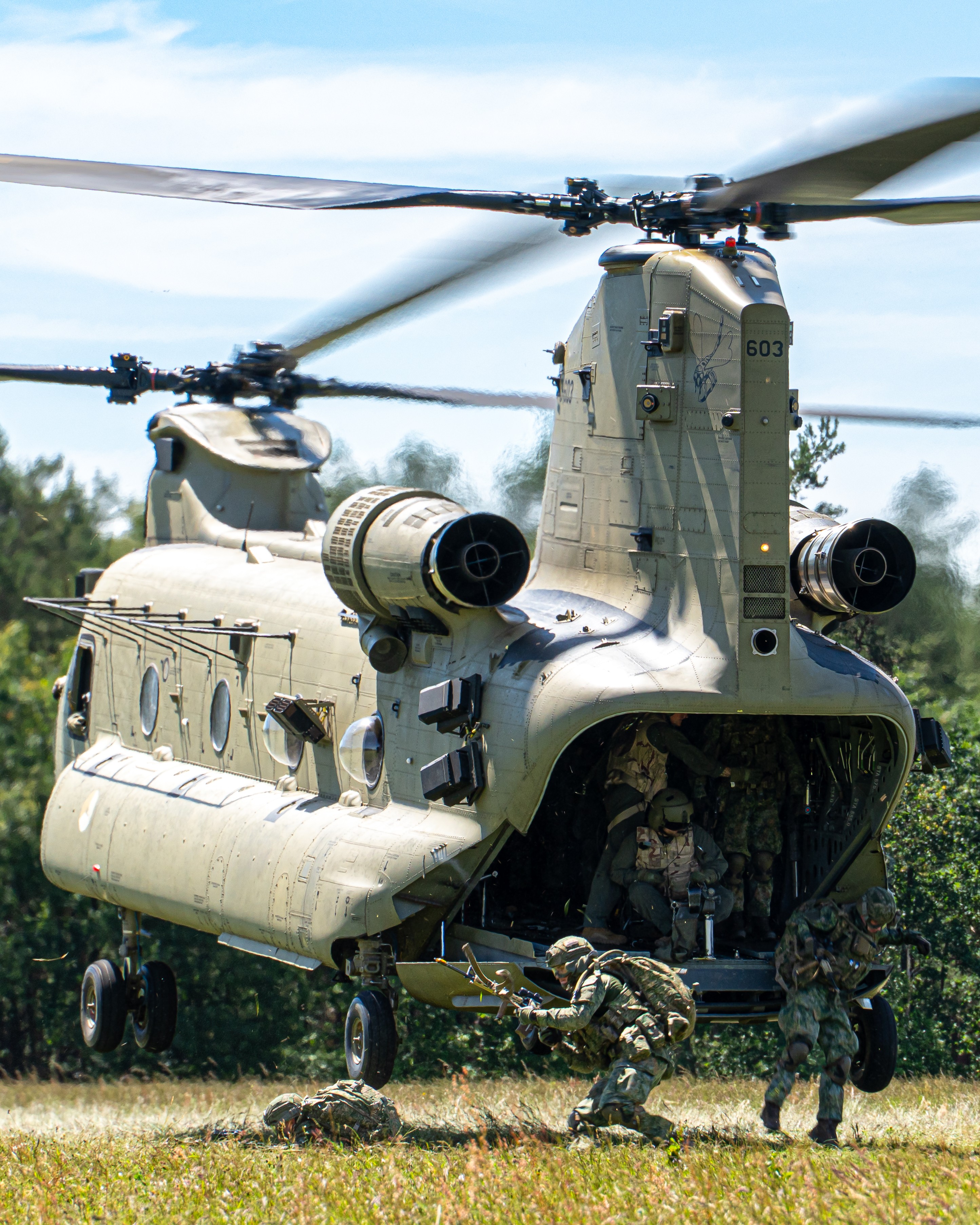 Here you see a Royal Netherlands Air Force CH-47F Chinook helicopter in action during a BHT exercise. The troops performed a 'hover jump.' It was amazing to see this action in real life; it felt just like watching a movie. I really enjoyed being able to capture it.
