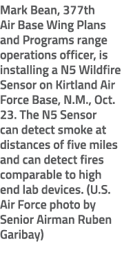 Mark Bean, 377th Air Base Wing Plans and Programs range operations officer, is installing a N5 Wildfire Sensor on Kir...