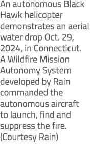 An autonomous Black Hawk helicopter demonstrates an aerial water drop Oct. 29, 2024, in Connecticut. A Wildfire Missi...