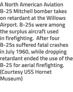 A North American Aviation B 25 Mitchell bomber takes on retardant at the Willows Airport. B 25s were among the surplu...