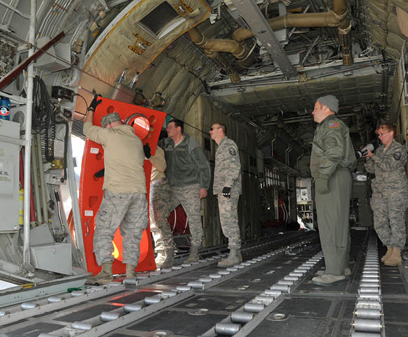 Members of the 153rd Airlift Wing, Wyoming Air National Guard, begin the installation process of the Military Airborne Firefighting System 2nd Generation, or MAFFS 2, on one of the Cheyenne unit's C-130 aircraft. Once the MAFFS 2 installation is complete, this C-130 and her crew, will be deployed to Dyess Air Force Base, Texas, to support the fight against the wildfires that have burned more than 1.5 million acres in west Texas. The Wyoming Air National Guard has been fighting Texas fires since April 18.