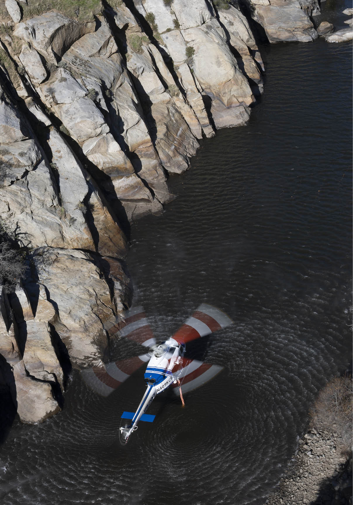 A small airplane is seen flying over a body of water. AI generated content