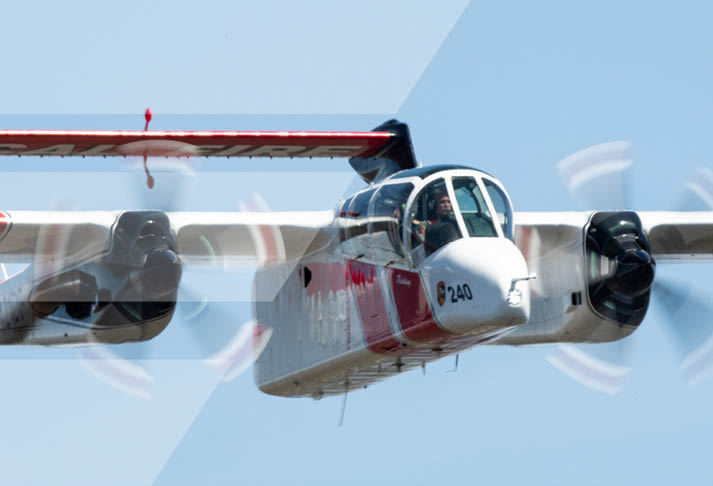 A red and white airplane with propellers flying in the sky. AI generated content