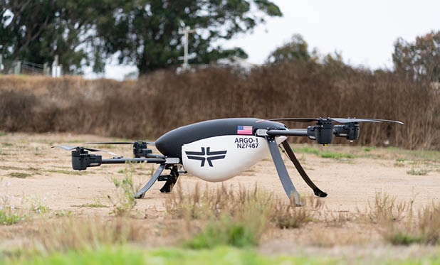 A drone is sitting on the ground in a field. AI generated content