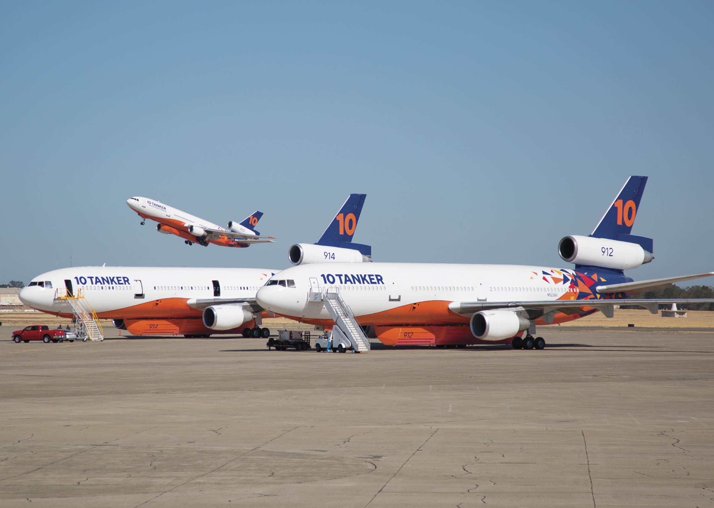 Three airplanes are parked on the tarmac, with one taking off and two others waiting. AI generated content