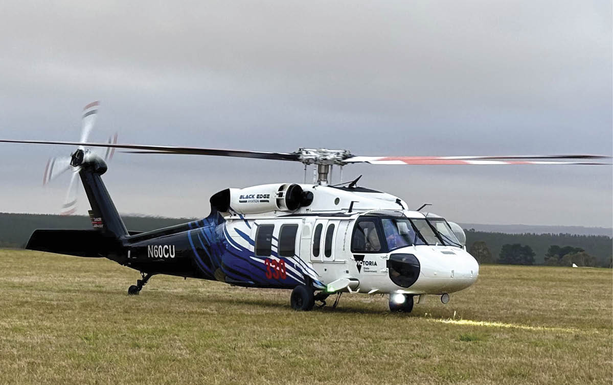 A large helicopter is parked on a grassy field. AI generated content