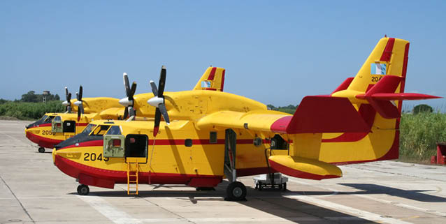 Three airplanes are parked on the tarmac, with one being yellow and red. AI generated content