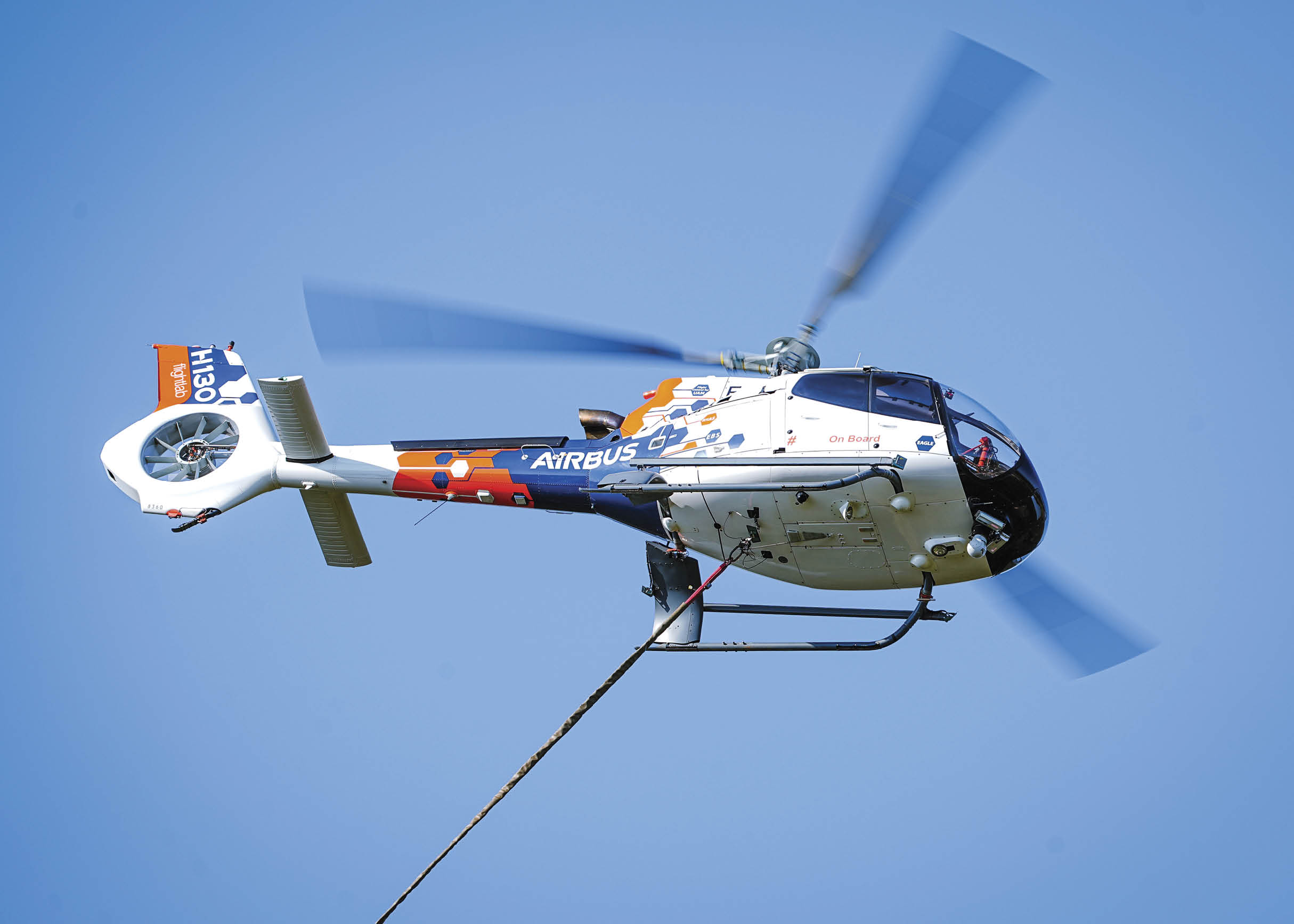A helicopter with a red and blue tail is flying in the sky. AI generated content
