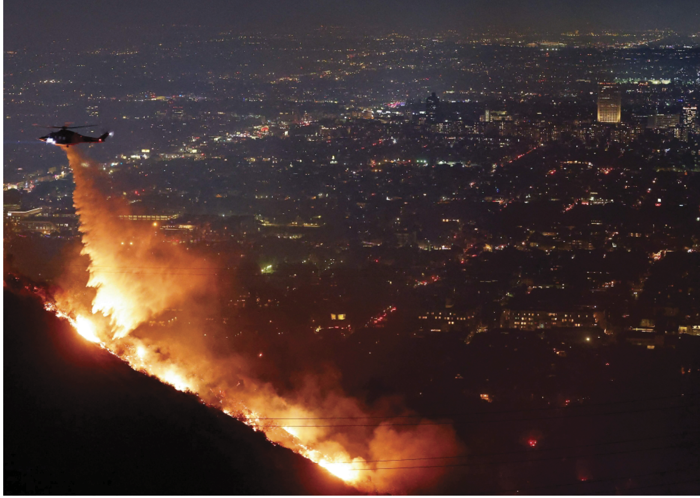 A helicopter is flying over a city at night, with a fire visible in the distance. AI generated content