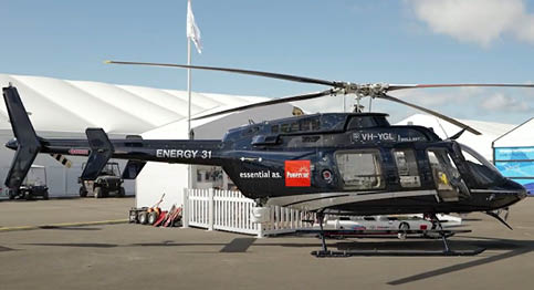 A yellow and black helicopter is parked on a runway. AI generated content