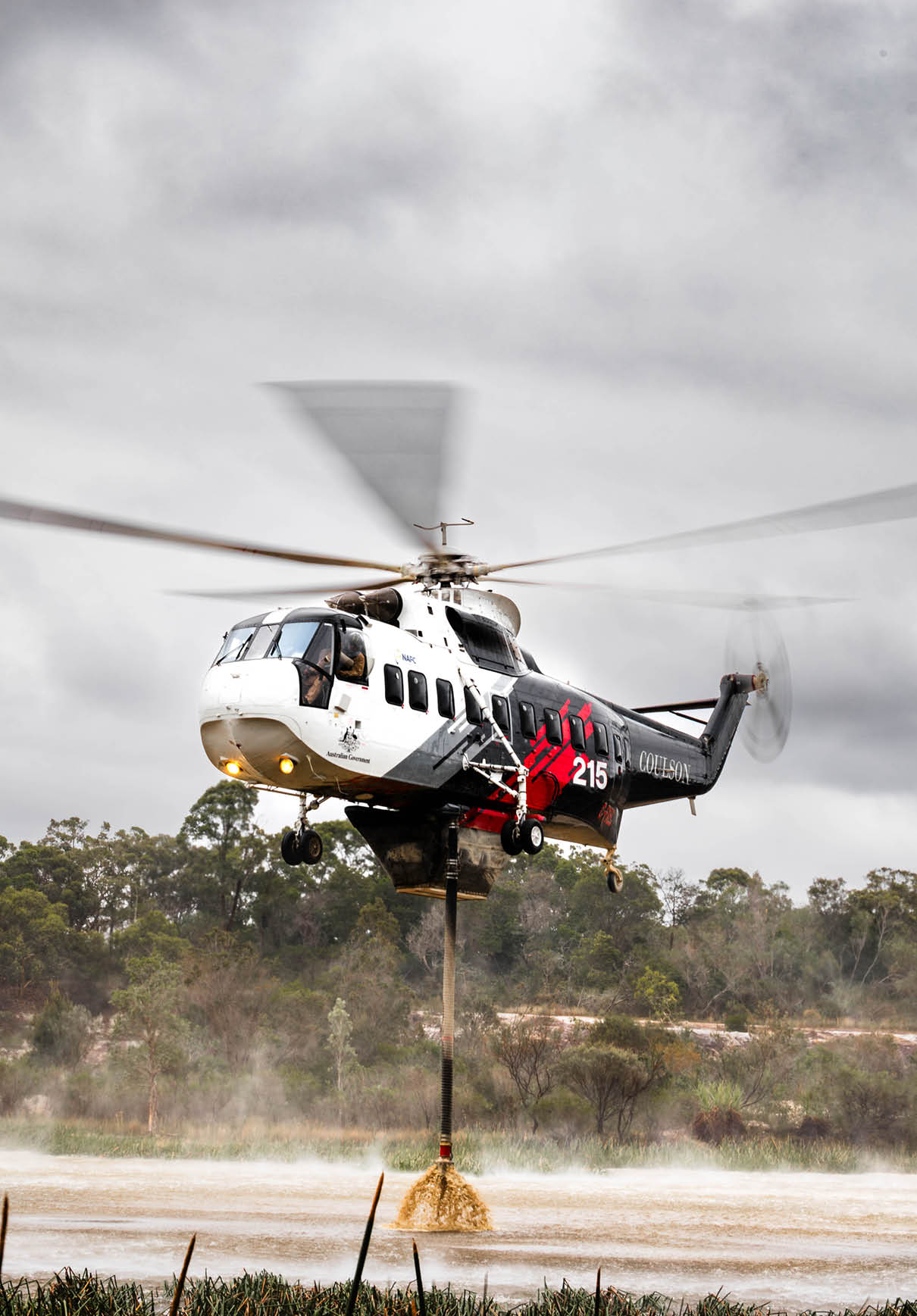 A helicopter is flying with a rope attached to it, which is connected to a person. AI generated content