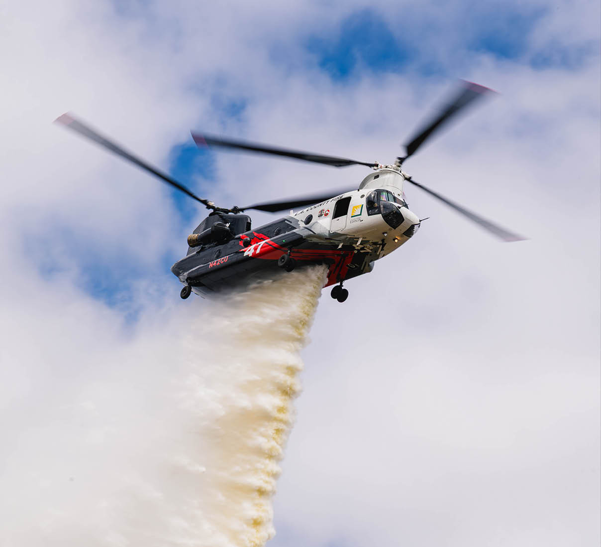 A helicopter with the number 04 on it is flying in the air. AI generated content