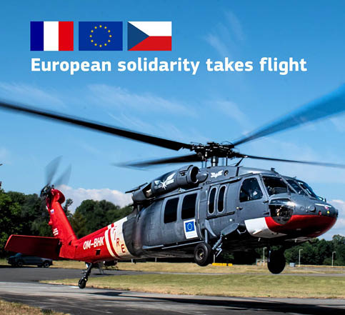A yellow and black helicopter is parked on a runway. AI generated content