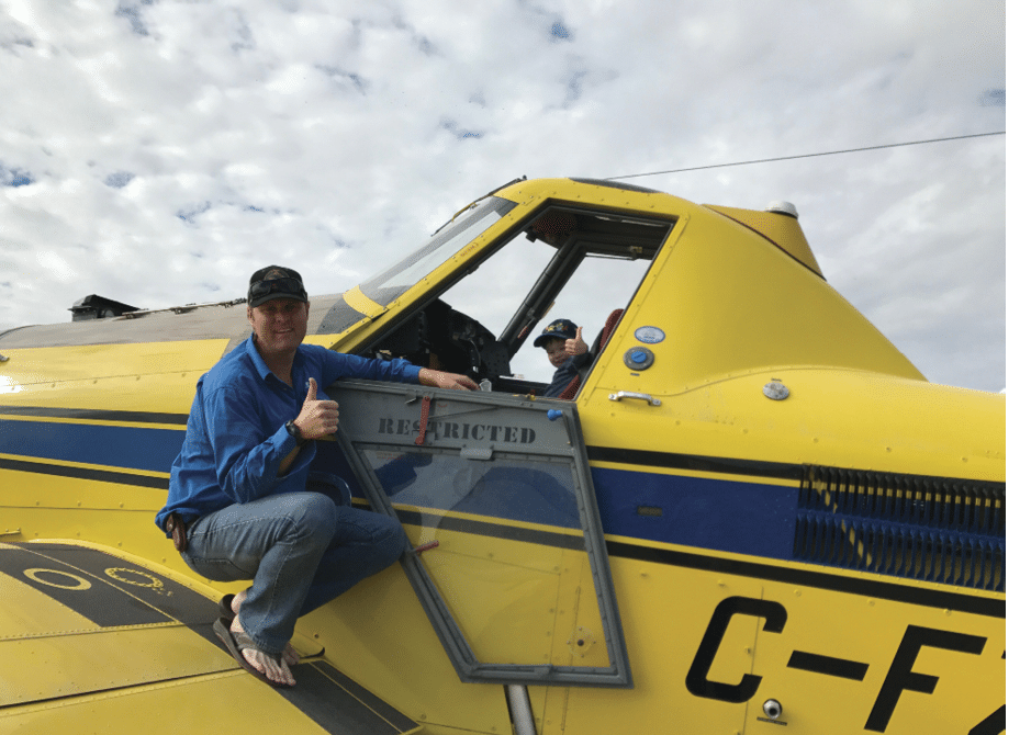 A small plane is flying in the air with its landing gear down. AI generated content