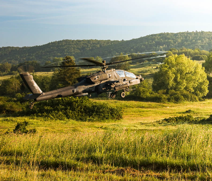 A U.S. Army Boeing AH-64 Apache, assigned to the 101st Airborne Division, hovers over a field during Exercise Combined Resolve 24-02 at the Hohenfels Training Area, Joint Multinational Readiness Center, Germany, June 5, 2024.   Combined Resolve is a U.S. Army Europe and Africa exercise training U.S. Soldiers and NATO allies and partners, providing training in support of NATO deterrence initiatives. Approximately 4,000 soldiers from 14 nations participated in Combined Resolve 24-02. (U.S. Army photo by Pfc Jaimee Perez)