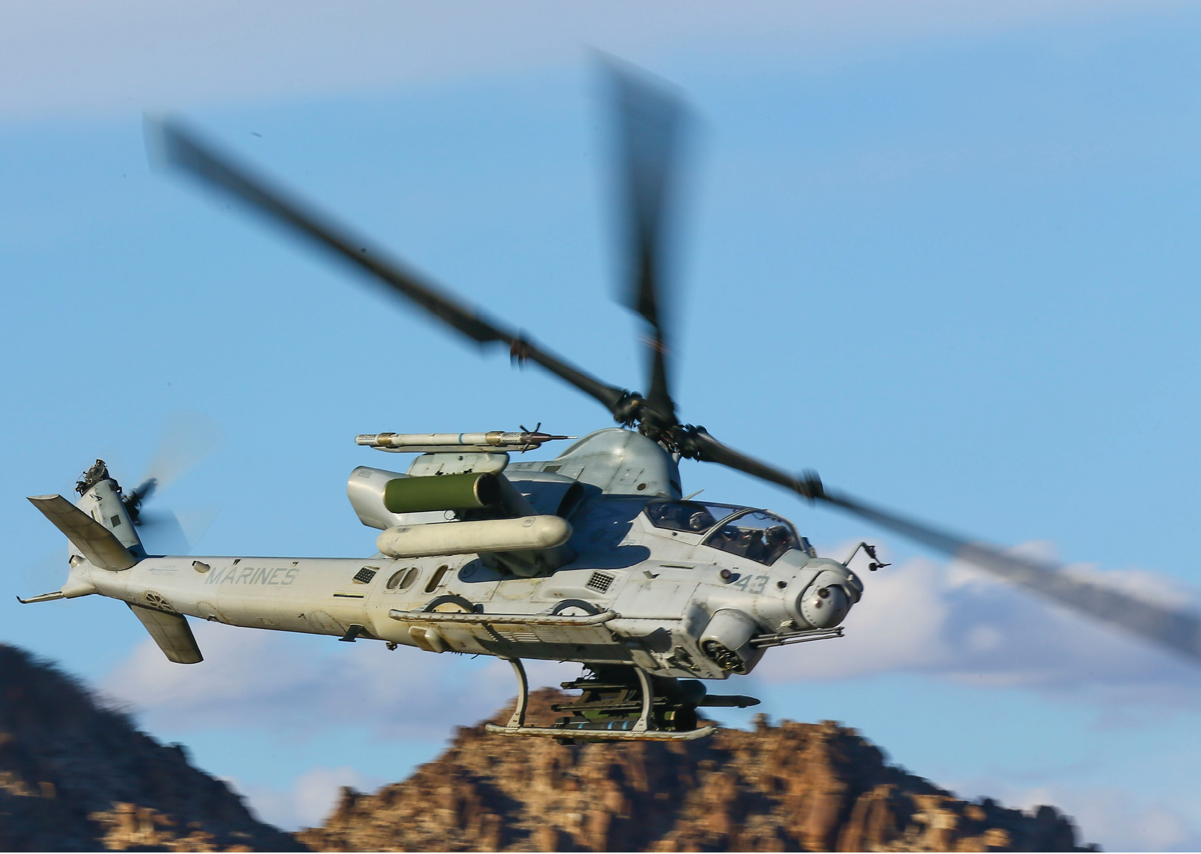 A U.S. Marine Corps AH-1Z Viper assigned to Marine Aviation Weapons and Tactics Squadron One (MAWTS-1) conducts an offensive air support exercise at Mt. Barrow, Chocolate Mountain Aerial Gunnery Range, Calif., Oct. 6, 2015. The exercise is part of Weapons and Tactics Instructor (WTI) 1-16, a seven-week training event hosted by MAWTS-1 cadre. MAWTS-1 provides standardized tactical training and certification of unit instructor qualifications to support Marine Aviation Training and Readiness and assists in developing and employing aviation weapons and tactics. (U.S. Marine Corps photograph by SSgt. Artur Shvartsberg, MAWTS-1 COMCAM/ Released)