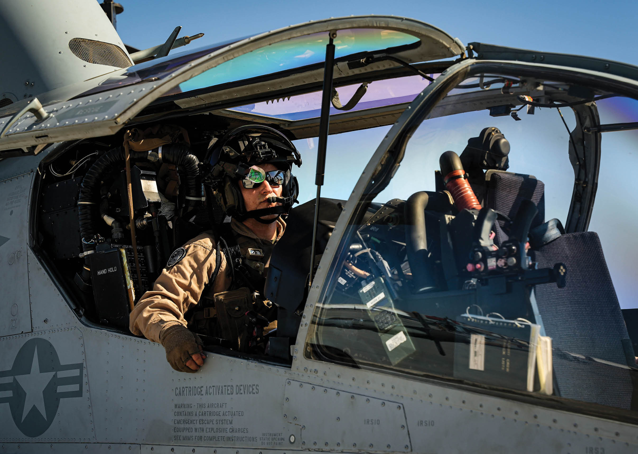 A U.S. Marine Corps AH-1Z Viper helicopter pilot assigned to Marine Aviation Weapons and Tactics Squadron One, prepares for takeoff during Weapons and Tactics Instructor (WTI) course 1-24 at Marine Corps Air Station Yuma, Arizona, Sept. 28, 2023. WTI is an advanced, graduate-level course for selected pilots and enlisted aircrew providing standardized advanced tactical training and assists in developing and employing aviation weapons and tactics. (U.S. Marine Corps photo by Lance Cpl. Emily Hazelbaker)