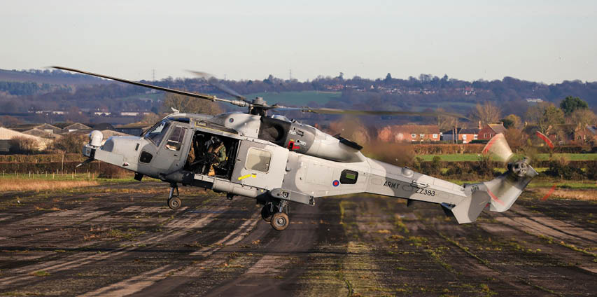 Pictured: A Wildcat from 847 NAS attempts to stop vehicles during a vehicle interdication exercise at Keevil airfield. On the 28th November 2024 a vehicle interdiction exercise took place at Keevil Airfield in Wiltshire. The exercise involved helicopters from 847 NAS operating the Wildcat. The helicopters were supported by Royal Marine troops from 42 Commando.  The exercise focused on vehicle interdiction, a critical military tactic that involves stopping and inspecting vehicles to identify and neutralise 