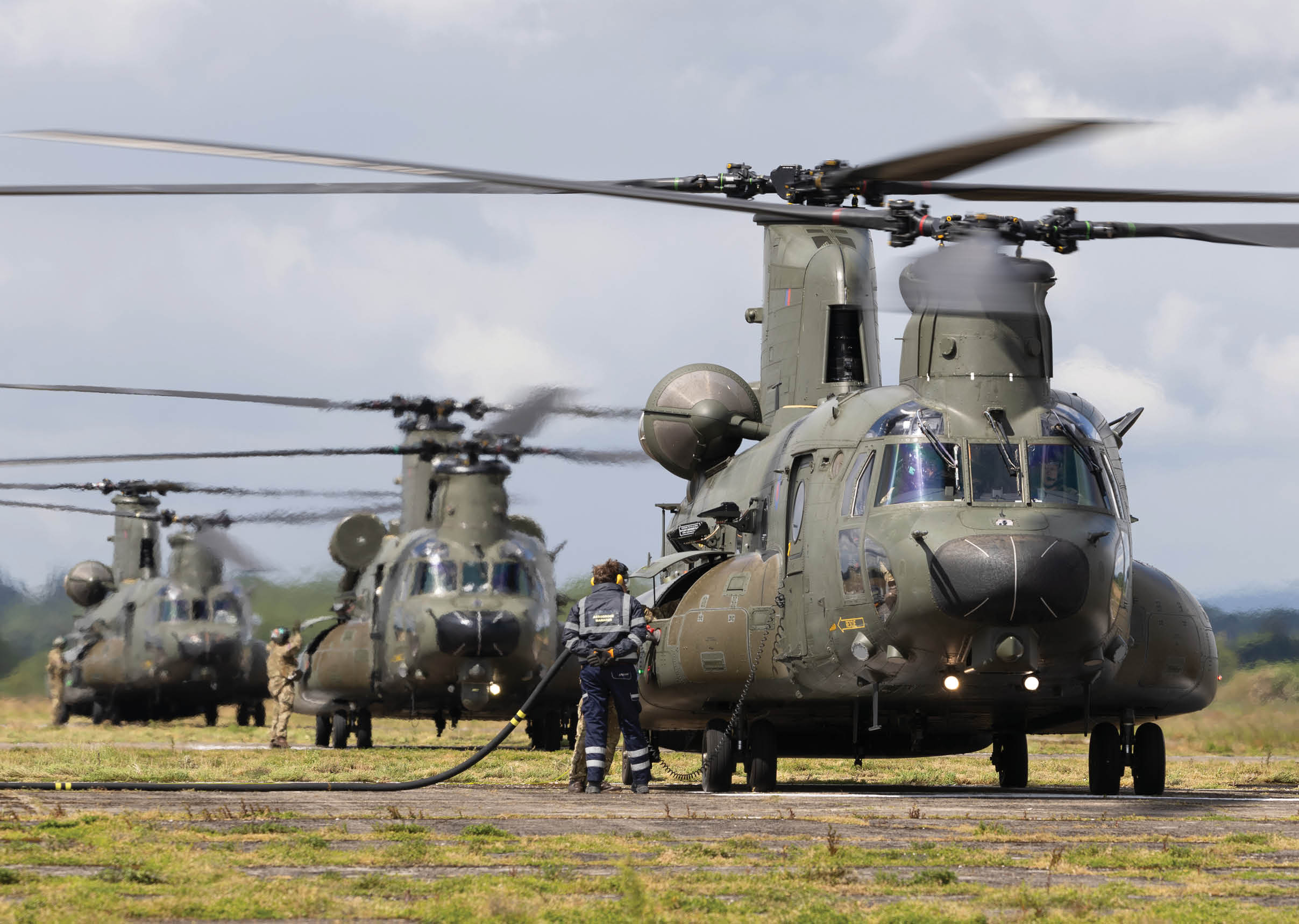 Pictured: Three RAF 27 Squadron Chinooks stop to refuel during their journey from RAF Odiham, Hampshire up to RAF Lossiemouth in Scotland for Ex TARTAN TUSKER stop to take on fuel on the 10/06/2024. Exercise TARTAN TUSKER is a 27 Squadron led training event, based out of RAF Lossiemouth, which exercises the Chinook Force’s ability to deploy personnel and aircraft to an unfamiliar operating area within the UK.   TARTAN TUSKER will allow the aircrew to practise high technical merit skills and conduct tasking with British Army and Royal Marine Units based around Scotland. 
