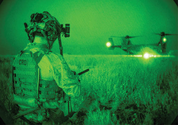 A U.S. Air Force pararescueman assigned to the 82nd Expeditionary Rescue Squadron secures the landing zone after being dropped off by an MV-22B Osprey during a personnel recovery training exercise at an undisclosed location near Camp Lemonnier, Djibouti, December 15, 2024. The exercise challenged Airmen from the 82nd ERQS, the 10 Expeditionary Aeromedical Evacuation Flight, and Marines from the Marine Medium Tiltrotor Squadron 266 to deliver critical care in low-light and high-pressure environments. (U.S. Air Force photo by Staff Sgt. Jana Somero)