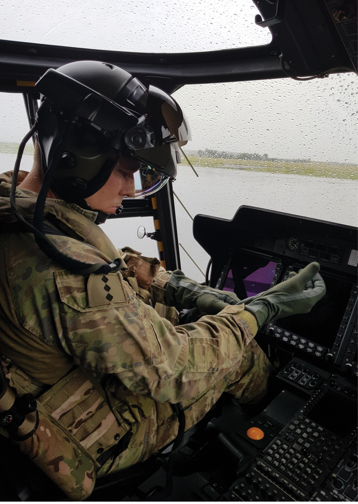 An Australian Army pilot from the Army Aviation Training Centre prepares to take off in an MRH-90 Taipan helicopter from Oakey in Queensland on Friday, 13 May 2022.