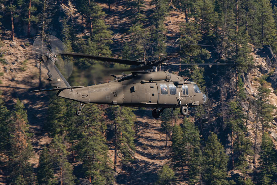 Idaho Army National Guard's State Aviation Group pilots from the 183rd Assault Helicopter Battalion fly a UH-60 Black Hawk over Idaho's beautiful landscapes on Oct. 5, 2024. (U.S. Air National Guard photo by Master Sgt. Becky Vanshur)