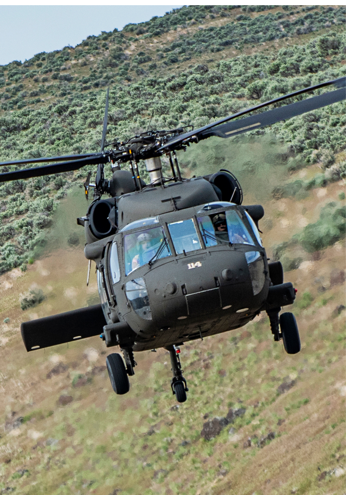 Chief Warrant Officer 4 Nate Spaulding and Warrant Officer 1 Tyler King, pilots with the Idaho Army National Guard's 183rd Aviation Regiment, practiced their flight maneuvers in the UH-60 Black Hawk helicopter around Idaho’s Orchard Combat Training Center and Saylor Creek Training Range on April 28, 2022. (U.S. National Guard photo by Master Sgt. Becky Vanshur)
