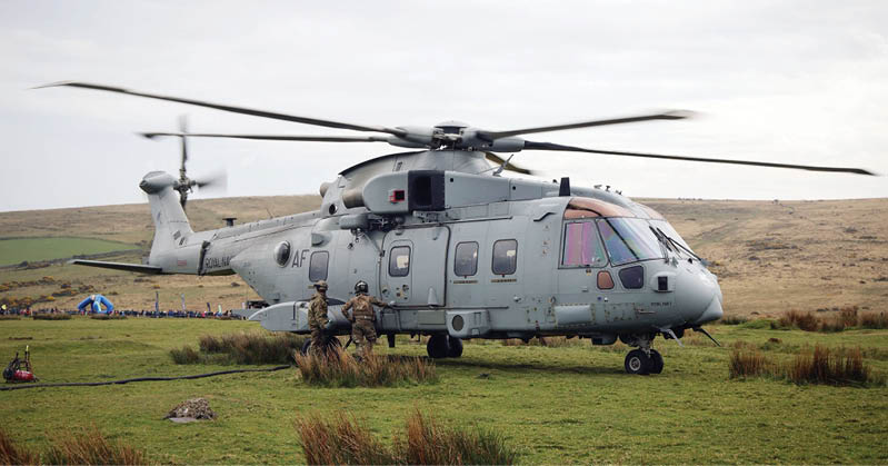 Pictured: A member of Tactical Support Wing (TSW) refuels a Merlin Mk4 from 846 NAS at Okehampton Camp during Ten Tors 2025 Merlin’s and their crews from 846 Naval Air Squadron, which are part of the Commando Helicopter Force, based at the Royal Naval Air Station Yeovilton in Somerset has provided the air support to this years Ten Tors event. Being able to swiftly fly over terrain impassable by vehicles or which would take considerable time on foot the helicopters provide logistic lift capability for the