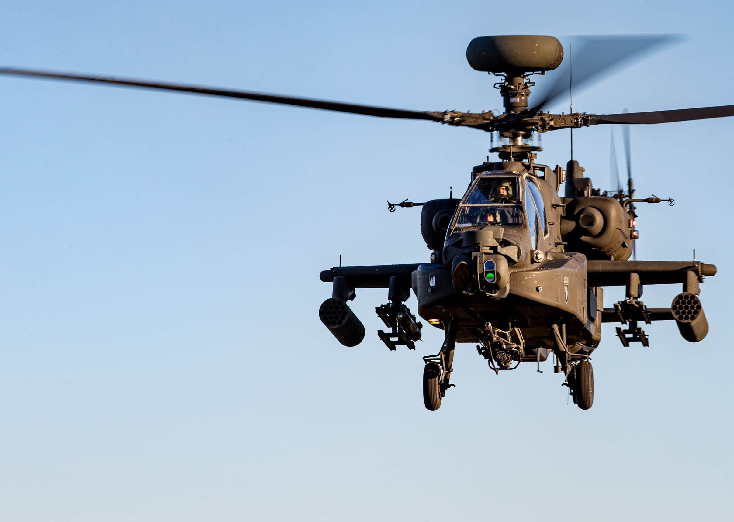 A U.S. Army AH-64E Apache helicopter flies over the Bombing Target 11 (BT-11) range on Piney Island, North Carolina, during Operation Razor Talon, Nov. 17, 2021. The BT-11 range, a satellite facility of Marine Corps Air Station Cherry Point, was used by U.S. Army Soldiers assigned to Charlie Company, 1st Battalion, 101st Aviation Regiment, 101st Airborne Division out of Fort Campbell, Kentucky. (U.S. Marine Corps photo by Lance Cpl. Lauralle Walker)