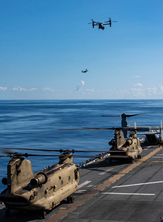 PACIFIC OCEAN (Sept. 7, 2025) Two U.S. Marine Corps MV-22B Osprey assigned to Medium Tiltrotor Squadron (VMM) 268 takeoff from the flight deck of the amphibious assault ship USS America (LHA 6) while conducting flight operations in the Pacific Ocean, Sept. 7. USS America (LHA 6) is operating in the U.S. 3rd Fleet area of operations. An integral part of the U.S. Pacific Fleet, U.S. 3rd Fleet leads naval forces in the Indo-Pacific and provides the realistic, relevant training necessary to execute the U.S. Navy’s role across the full spectrum of military operations. U.S. 3rd Fleet works together with allies and partners to advance freedom of navigation and overflight, the rule of law and other principles that underpin security for the Indo-Pacific region. (U.S. Navy photo by Mass Communication Specialist Seaman Nicholas Douglass)