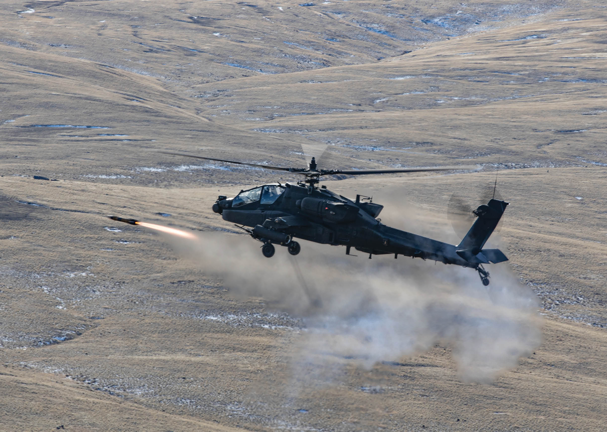 Soldiers assigned to 1-229 Attack Battalion, 16th Combat Aviation Brigade fire an AGM-114 Hellfire missile from their AH-64E Apache helicopter at Yakima Training Center, Wash. on Jan. 24, 2023.   U.S. Army photo by Capt. Kyle Abraham, 16th Combat Aviation Brigade