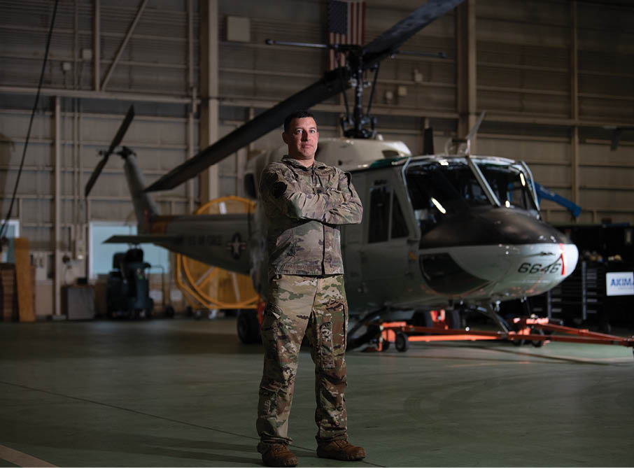 U.S. Air Force Lt. Col. Terry Martin, 374th Operations Group deputy commander, stands in front of a UH-1N Huey at Yokota Air Base, Japan, Sept. 5, 2025. The UH-1N first arrived at Yokota in 1980, and for over 45 years, the aircraft supported a wide range of missions across the region, including aeromedical evacuations and the transport of senior government officials. It also played a critical role in Operation Tomodachi following the Great East Japan Earthquake of 2011, conducting reconnaissance flights and low-level radiation mapping in the aftermath of the Fukushima Daiichi Nuclear Plant disaster. (U.S. Air Force photo by Staff Sgt. Natalie Doan)