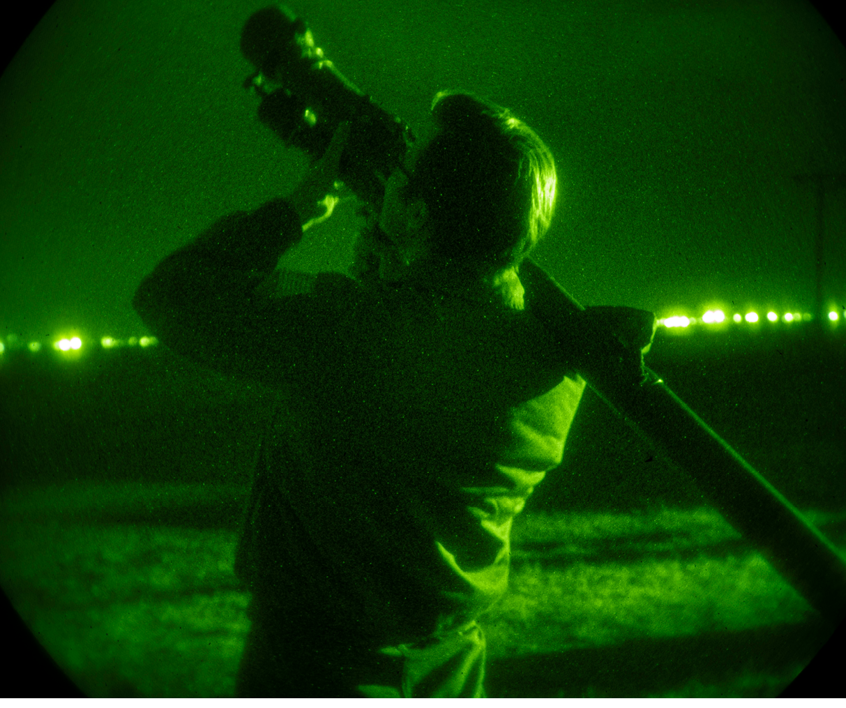 U.S. Air Force Senior Airman Josephus Straka, 909th Air Refueling Squadron in-flight refueling specialist, simulates nighttime ground threat using a training simulated man-portable air defense [missile] system during the threats and tactics phase of the 509th Weapons School (WPS) course at Roswell Air Center in Roswell, New Mexico, March 15, 2023. 509th WPS Students performed hands-on training and gained perspective as the aggressor using simulated man-portable air defense [missile] systems (MANPADS). (U.S. Air Force photo by 2nd Lt. Ariana Wilkinson)