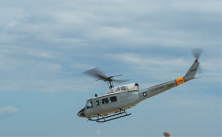Lt. Gen. John Dolan, U.S. Forces, Japan and 5th Air Force commander, pilots a 459th Airlift Squadron UH-1N Iroquois at Yokota Air Base, Japan, April 11, 2016. Yokota’s UH-1Ns are primarily used for local airlift, but they are also equipped with hoist capabilities and can be used for search and rescue operations. (U.S. Air Force photo by Airman 1st Class Elizabeth Baker/Released)