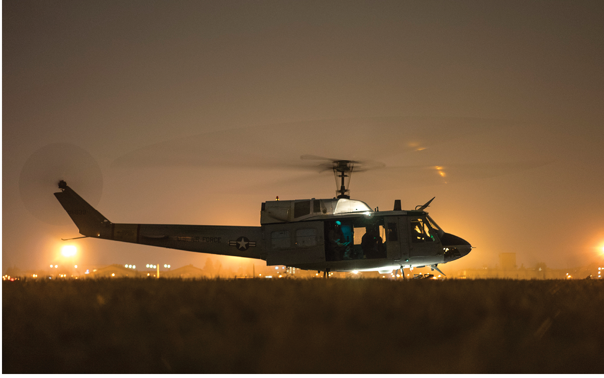 A 459th Airlift Squadron UH-1N Huey prepares for flight at Yokota Air Base, Japan, Feb. 23, 2016. The 459th AS recently improved their search and rescue capabilities by outfitting two UH-1N Hueys with new rescue hoists. (U.S. Air Force photo by Airman 1st Class Delano Scott/Released)