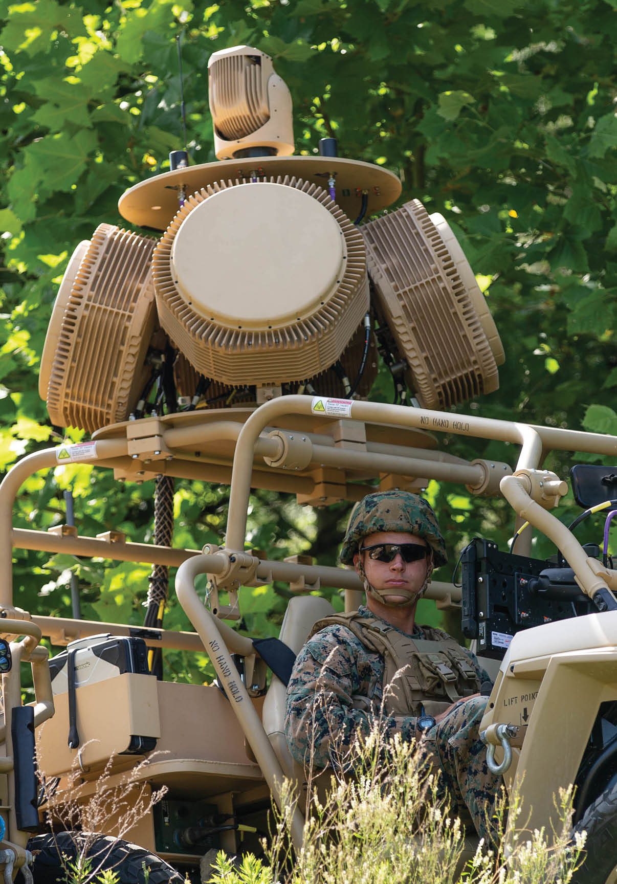 U.S. Marines with the Ground Based Air Defense Program, conduct a demonstration of the Light-Marine Air Defense Integrated System (L-MADIS), on Marine Corps Base Quantico, Virginia, June 30, 2021. The L-MADIS provides both kinetic and non-kinetic defeat capabilities to destroy or negate aerial threats in support of the Marine Air-Ground Task Force. L-MADIS will deploy in support of Marine Expeditionary Units and integrated onto a pair of utility task vehicles. (U.S. Marine Corps photo by Lance Cpl. Jessica A. Foraker)