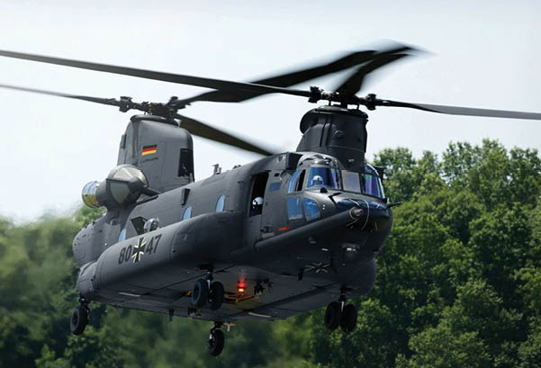 A large black helicopter with a blue nose is flying in the air. AI generated content