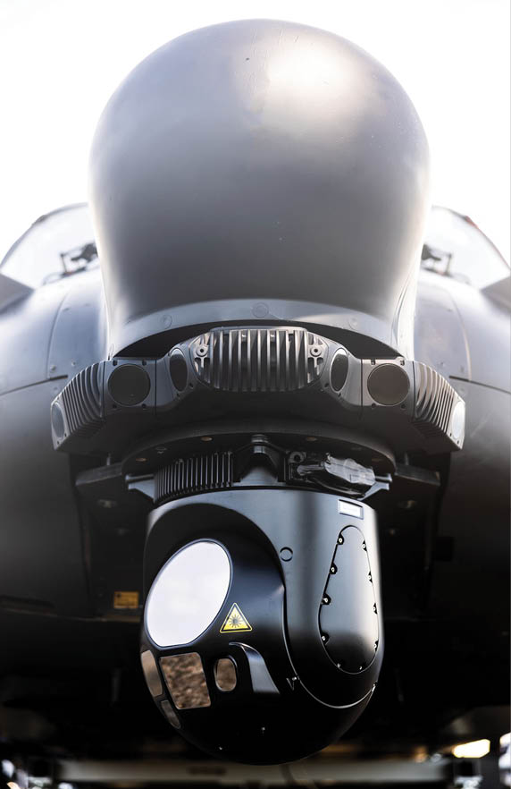 A close up of a jet engine with a yellow sticker on it. AI generated content