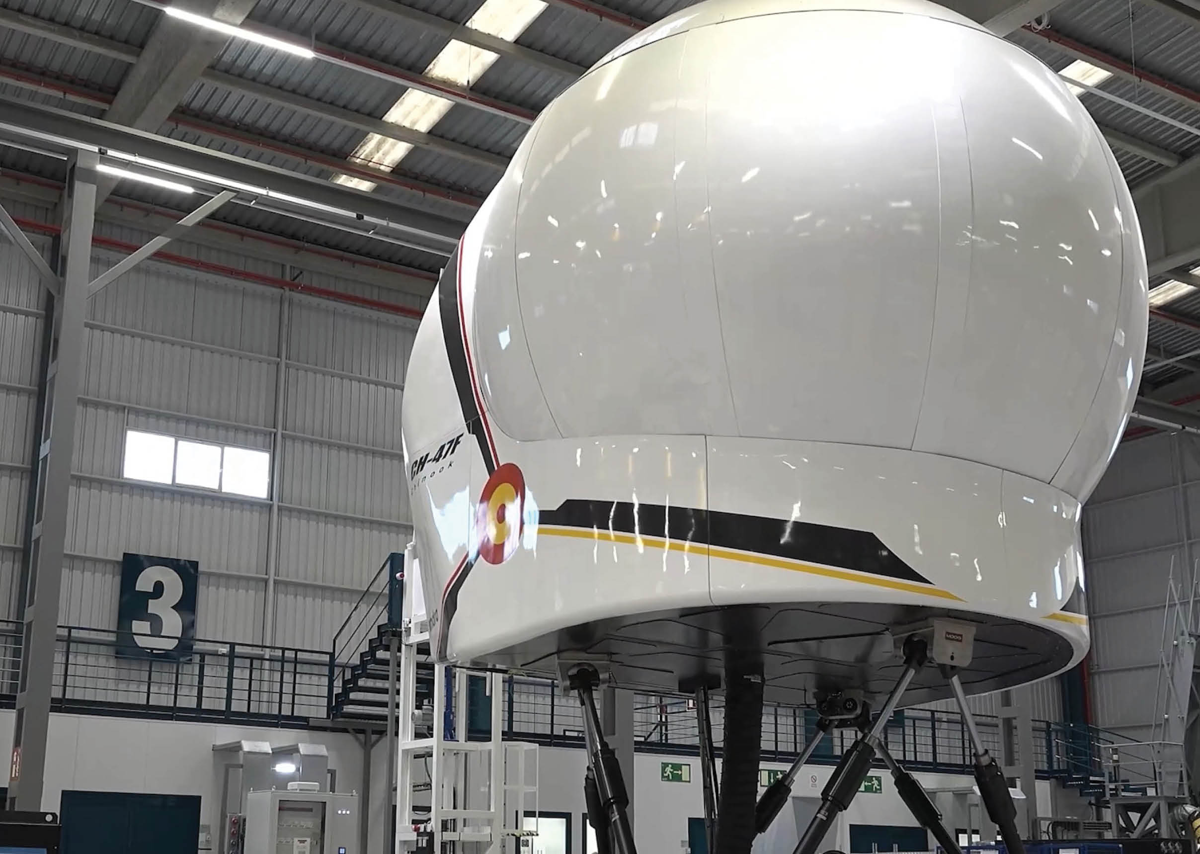 A large white dome with a black and yellow stripe is inside a building. AI generated content