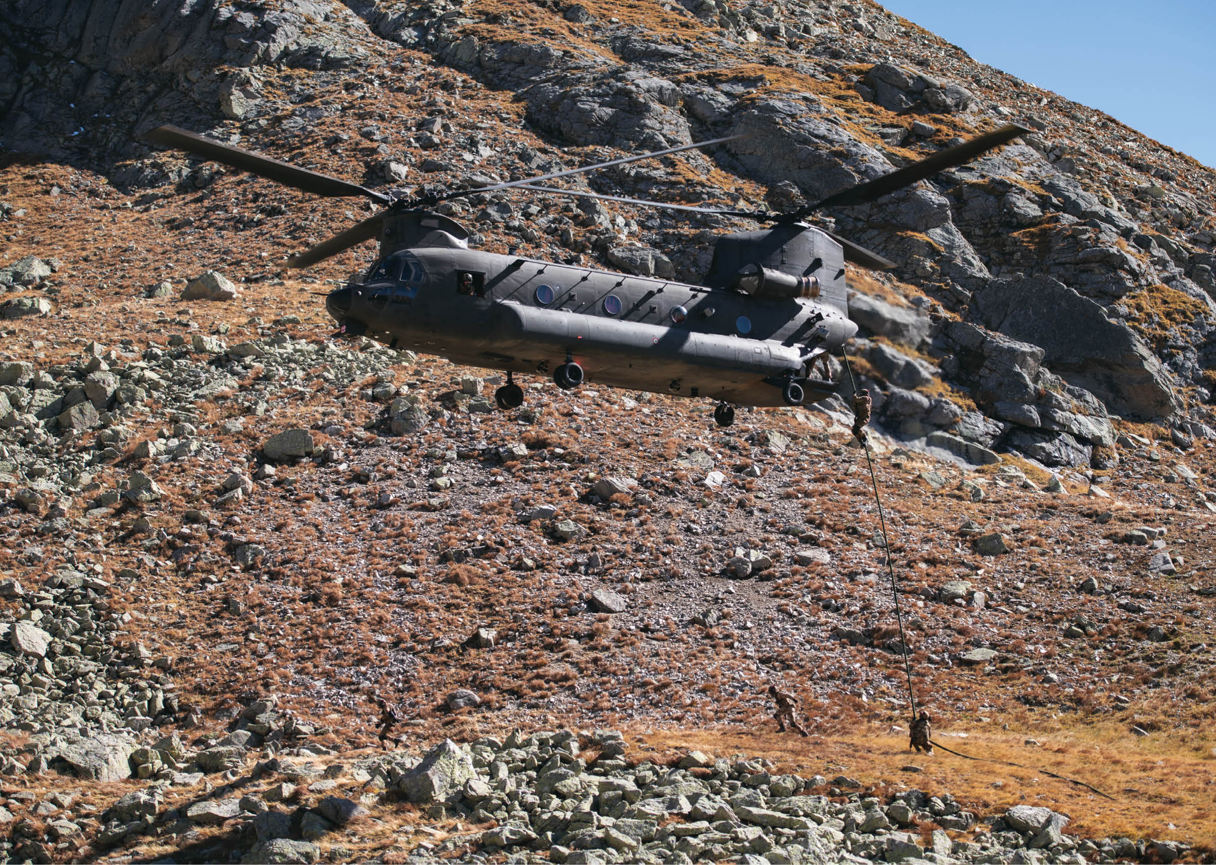 A helicopter is flying over a rocky hillside. AI generated content