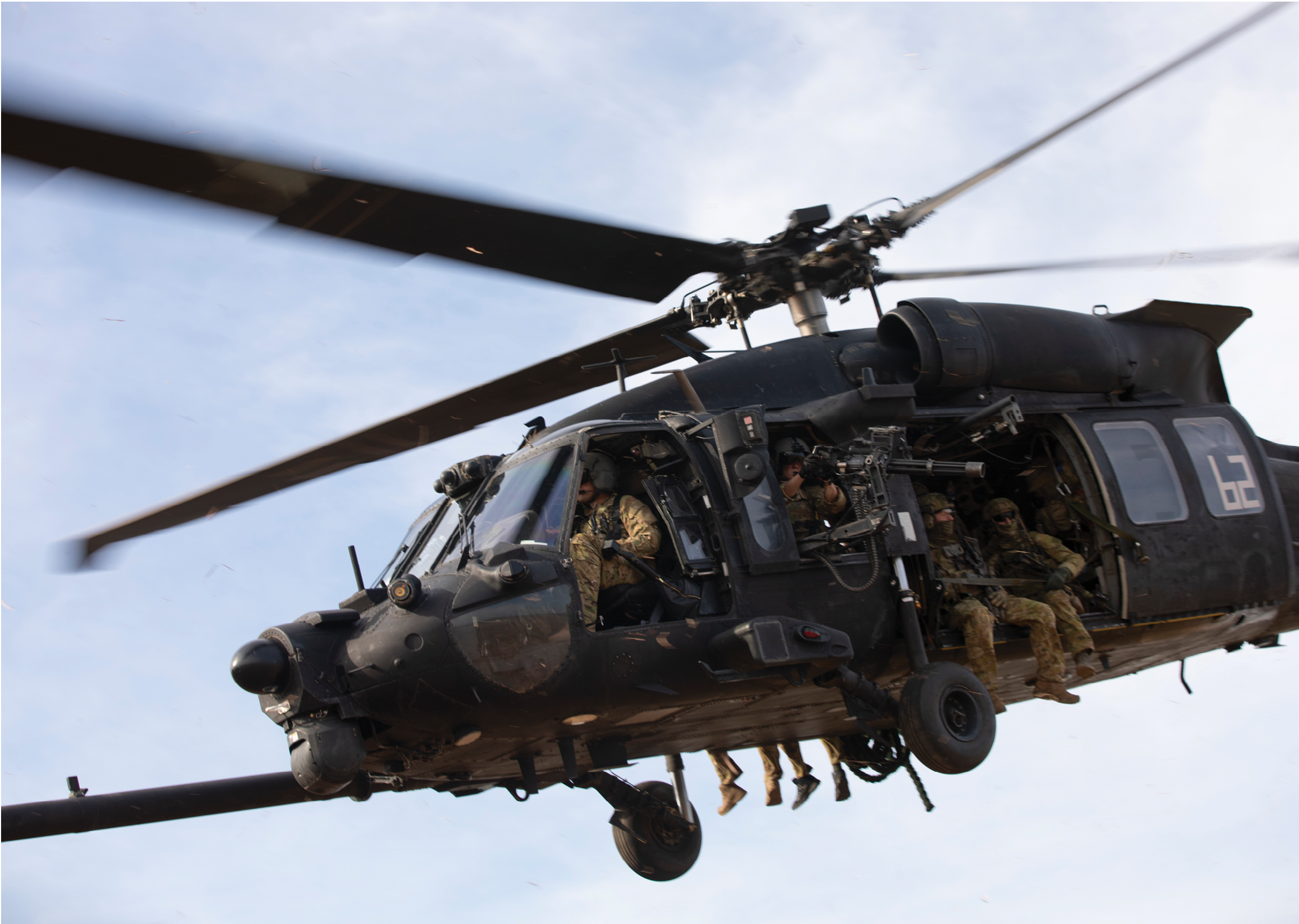 A helicopter with a group of soldiers on board is flying in the air. AI generated content