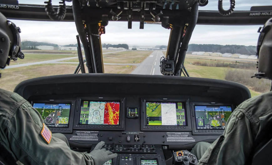 Two pilots in green uniforms are in a helicopter, flying over a runway. AI generated content