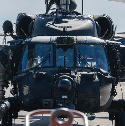 Three men are standing next to a helicopter. AI generated content