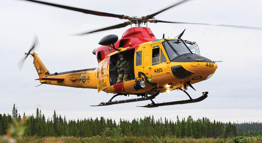 A red and yellow helicopter with a man inside is flying in the air. AI generated content