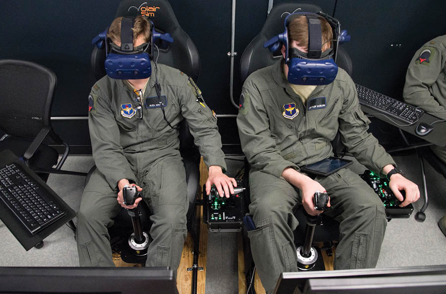 Two men wearing virtual reality gear are sitting in chairs, playing video games. AI generated content